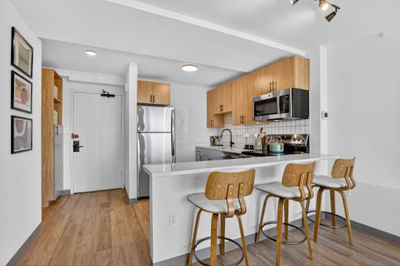 Fully Equipped Kitchen With Modern Appliances at Reflections at the Wharf, Washington, DC
