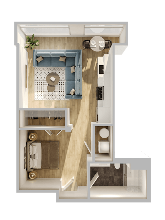 A top down view of a living room with a couch, coffee table, and kitchen area.
