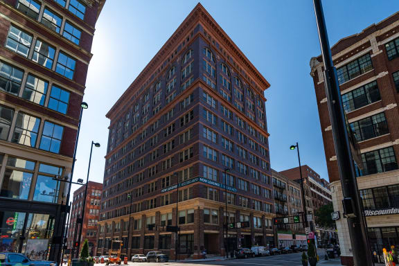 a tall brick building on a city street at Textile Apartments, Cincinnati, OH, 21286