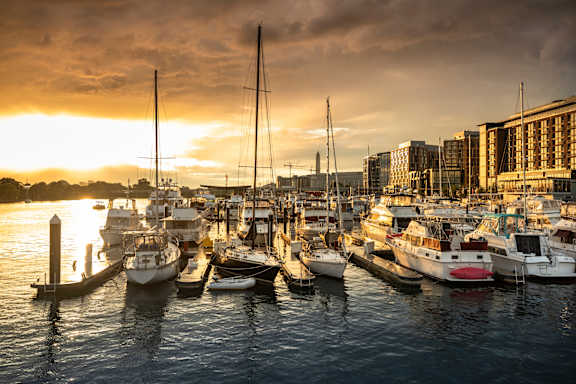A marina filled with boats at sunset at Artline Apartments, Washington, DC, 20024