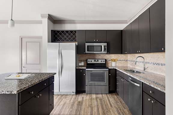 Modern Kitchen With Stainless Steel Appliances And Double Door Refrigerators at Adara Overland Park, Overland Park, KS, Kansas