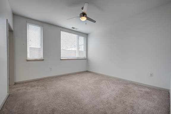 Room with Ceiling Fan at 747 Apartments, Indiana, 46202