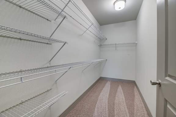 Walk-In Closets With Built-In Shelving at Adara Overland Park, Overland Park, Kansas