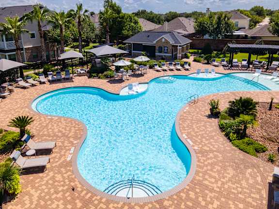 Clear Blue Pool at Avenues at Shadow Creek Ranch Apartments, Pearland, Texas