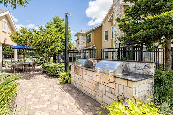 Courtyard With Grills at Avenues at Tuscan Lakes, League City, 77573