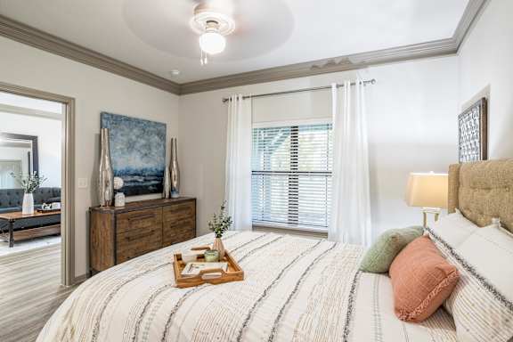 Bedroom with Window at Avenues at Tuscan Lakes, Texas