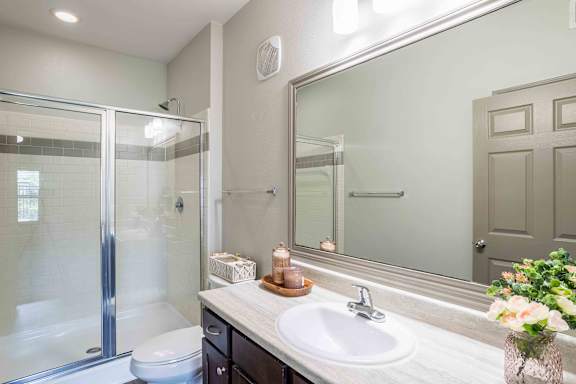 Bathroom with Mirror at Avenues at Tuscan Lakes, Texas