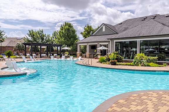 A large outdoor swimming pool at Avenues at Shadow Creek Ranch Apartments, Pearland, Texas