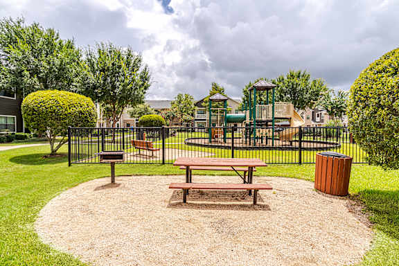 Sitting area in playground at Avenues at Shadow Creek Ranch Apartments, Pearland, TX, 77584