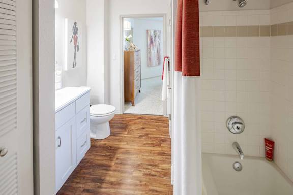 Bathroom with Wooden Cabinet at Butternut Ridge Apartments, North Olmsted, OH, 44070