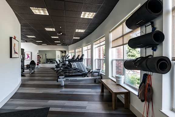 A gym with treadmills, exercise bikes, and weights. at CityView, North Kansas City