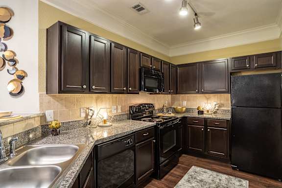 Kitchen with cabinets at Grand Villas at Cinco Ranch, Texas, 77494