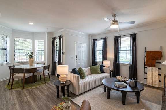 Living room with ceiling fan at Grand Villas at Cinco Ranch, Katy, TX, 77494