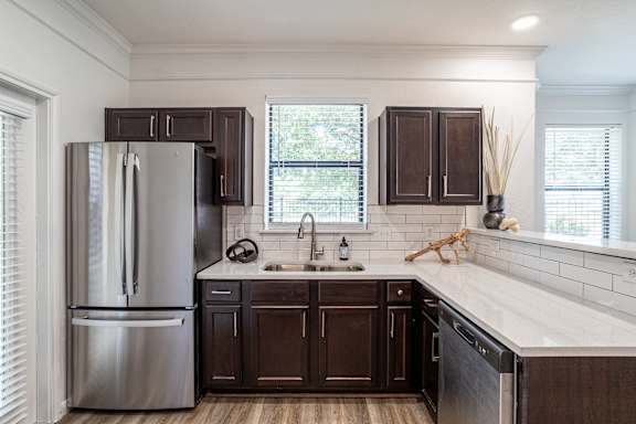 Kitchen with dishwasher at Grand Villas at Cinco Ranch, Texas