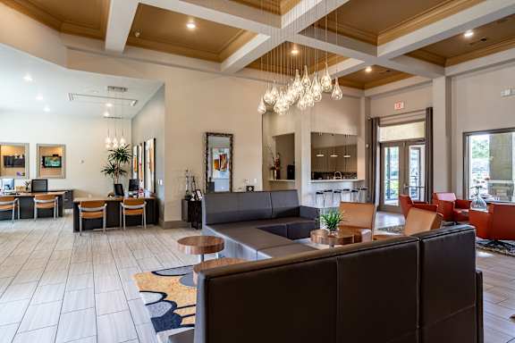 Common room with fancy lights at Grand Villas at Cinco Ranch, Katy
