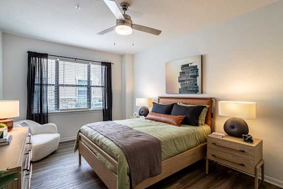 Bedroom with ceiling fan at Grand Villas at Cinco Ranch, Texas