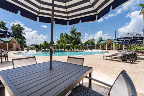Seating around the pool at Imperial Lofts, Sugar Land