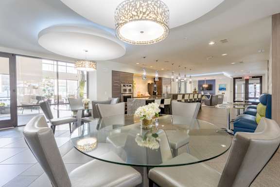 Dining room with Glass table at Imperial Lofts, Sugar Land, TX