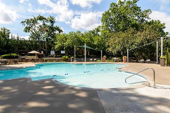 A large outdoor swimming pool at London House Apartments, Kansas