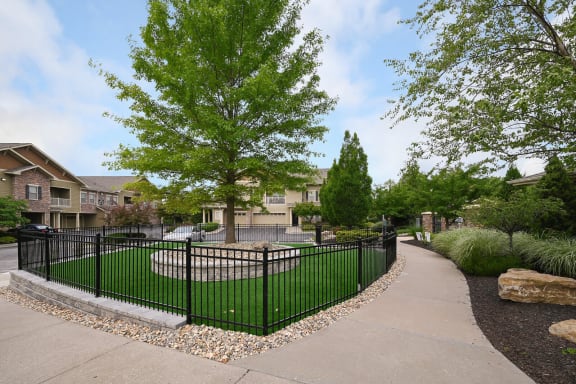 the preserve at ballantyne commons apartments walkway and gatedenced in yard at Sovereign at Overland Park, Overland Park, KS 66213