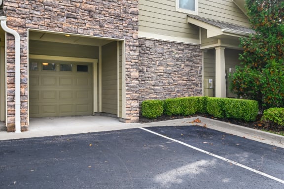 a garage door on the side of a building at Sovereign at Overland Park, Kansas, 66213