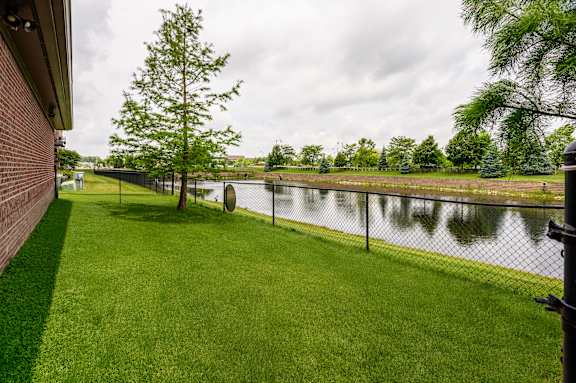 Pond With Green Landscape at Penn Circle, Carmel, IN