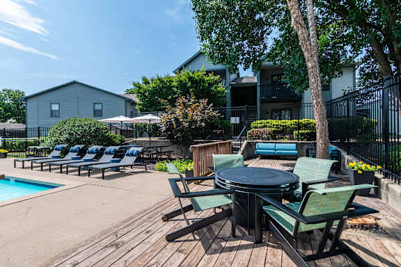 Pool side seating area at Springhill Apartments, Overland Park, Kansas