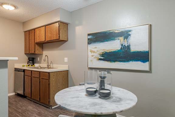 Kitchen with Painting on Wall at Springhill Apartments, Overland Park, Kansas