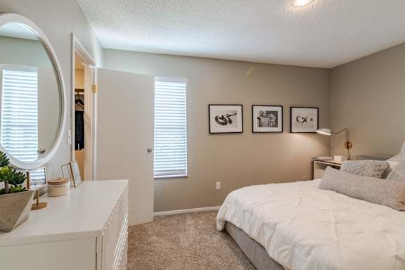 Bedroom with bed and nightstand at Springhill Apartments, Kansas, 66213