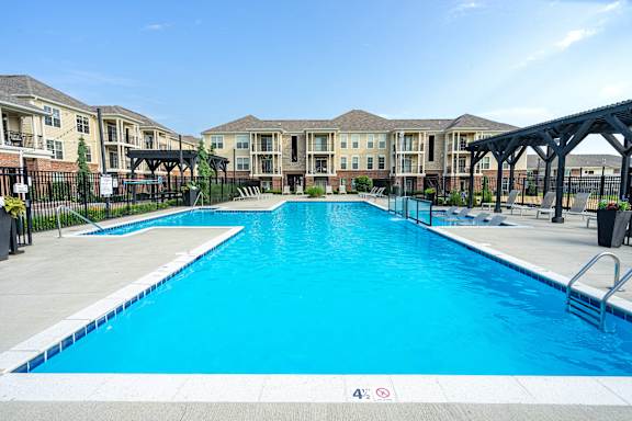 A large swimming pool in front of apartment buildings. at The Greyson, Hilliard, OH, 43026