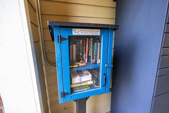 A blue Little Free Library box  at The Greyson, Hilliard, OH, 43026