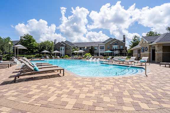 Pool Along with sitting area at Waterstone at Cinco Ranch Apartments, Katy, 77450