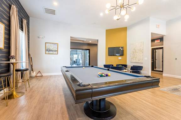Pool Table in living area at Waterstone at Cinco Ranch Apartments, Texas