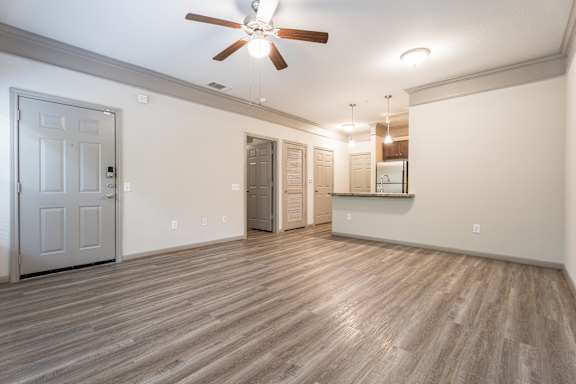 Empty room with Wooden Carpet at Waterstone at Cinco Ranch Apartments, Texas