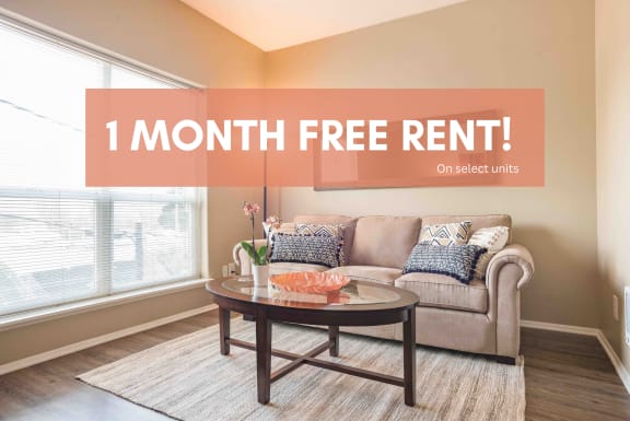a living room with a couch and coffee table and the words 1 month free rent on select