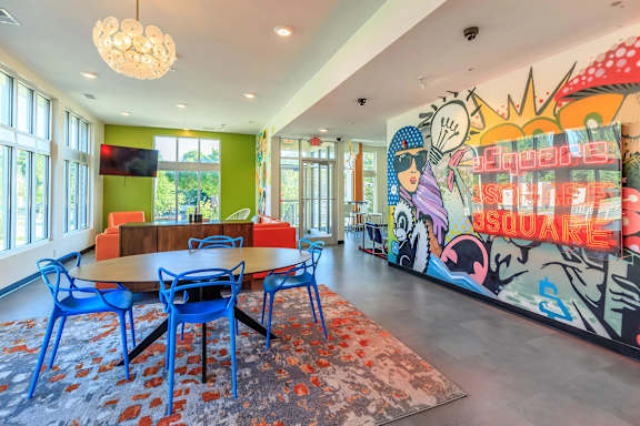 A brightly colored mural with the word "Inspire" written on it.