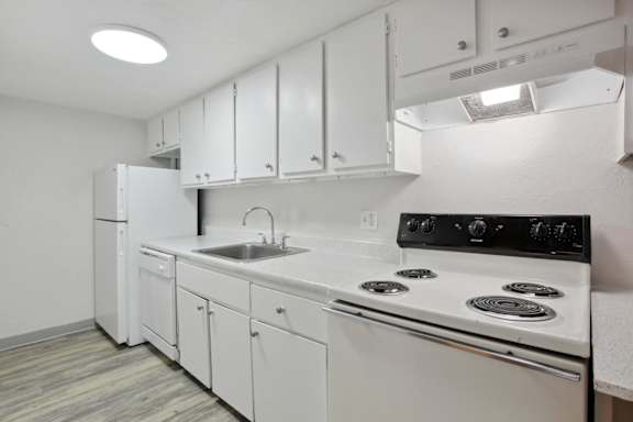 Kitchen with Cabinets at Lakeridge Terrace Apartments, Denver, CO, 80227