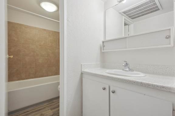 White Bathroom Interior at Lakeridge Terrace Apartments, Denver, Colorado