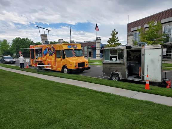 Food truck at the side of the road at Enclave Apartments, Henderson, CO