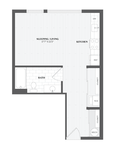 A floor plan of a small apartment with a sleeping area, kitchen, and bathroom.