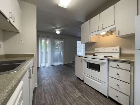 Kitchen with sink and stove at Arbor Pointe, Lakewood, 98498
