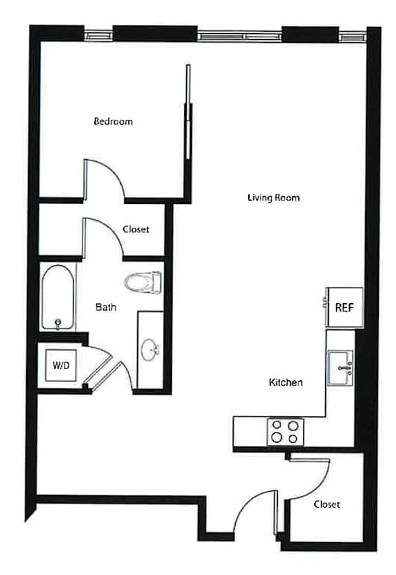 A floor plan of a small apartment with a bedroom, living room, kitchen, and bathroom.