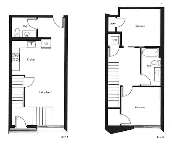 A black and white image of a floor plan for a two-level home.