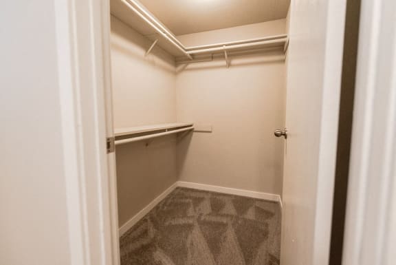 a walk in closet in an empty basement room&#xA0;at Cambridge on Seventh, Puyallup, WA
