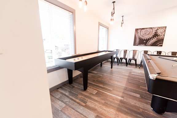 a game room with a pool table and chairs at Notch 8, Washington, 98444