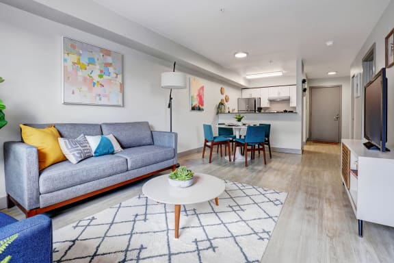 a living room with a couch and a table
