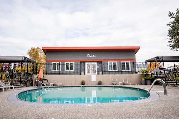 the pool is in front of the clubhouse at the resort at The Aviator, Washington