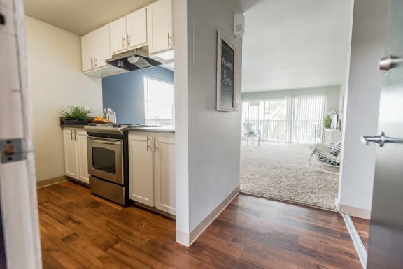 the view of a kitchen and living room from the doorway at The Aviator, Washington, 98055