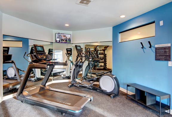 the gym with cardio equipment at our apartments at The Lynx Apartments, Washington, 98204