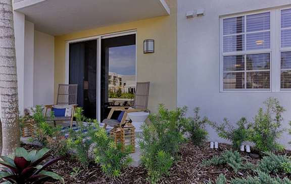 A house with a garden in front.